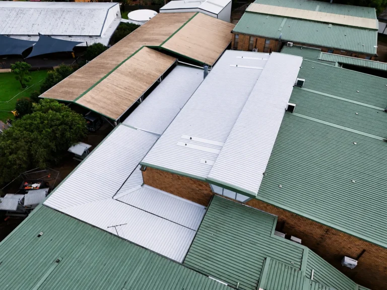 Metal roof replacement and repitching at a school in Baulkham Hills, Sydney